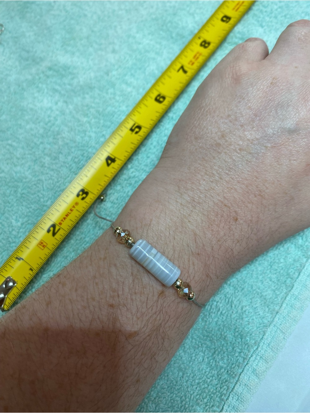 Dainty adjustable stone bracelet with silvertone earrings